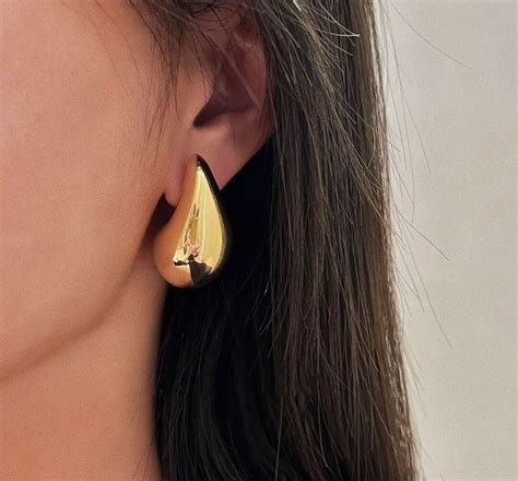 aretes bottega veneta originales